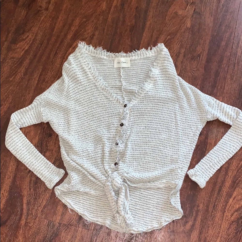 The Cove Grey and white striped knot sweater